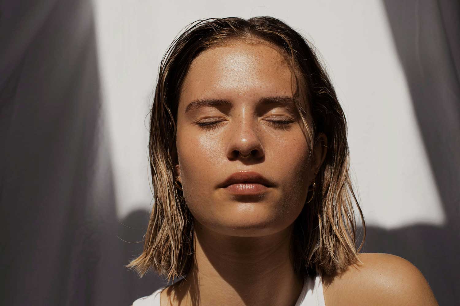 woman with glowing skin in the sun